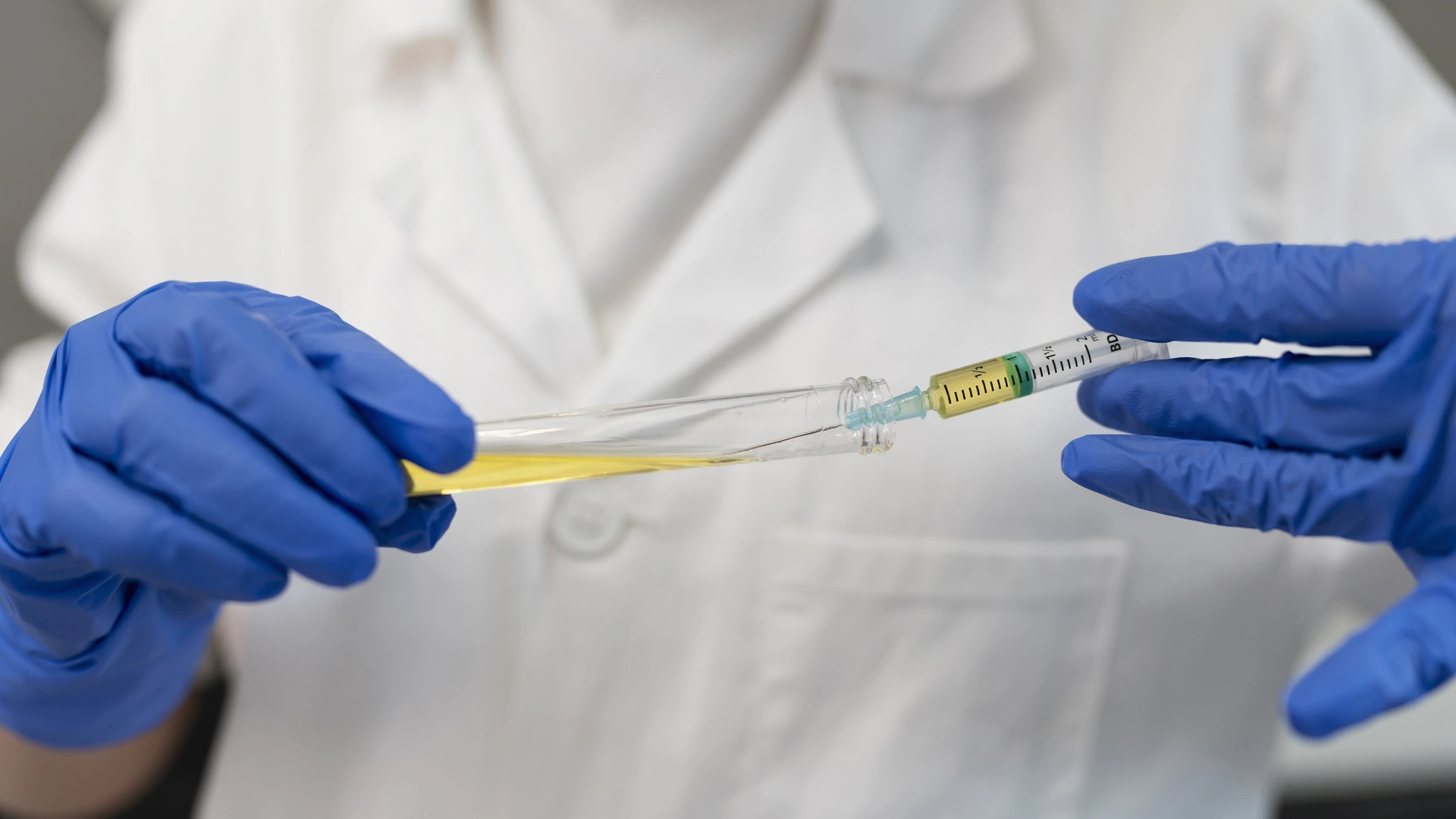 Exosome Therapy Boost After Microneedling — Elegance Clinic Clinician applying exosome serum after microneedling treatment on patient’s face at Elegance Cosmetic & Laser Clinic