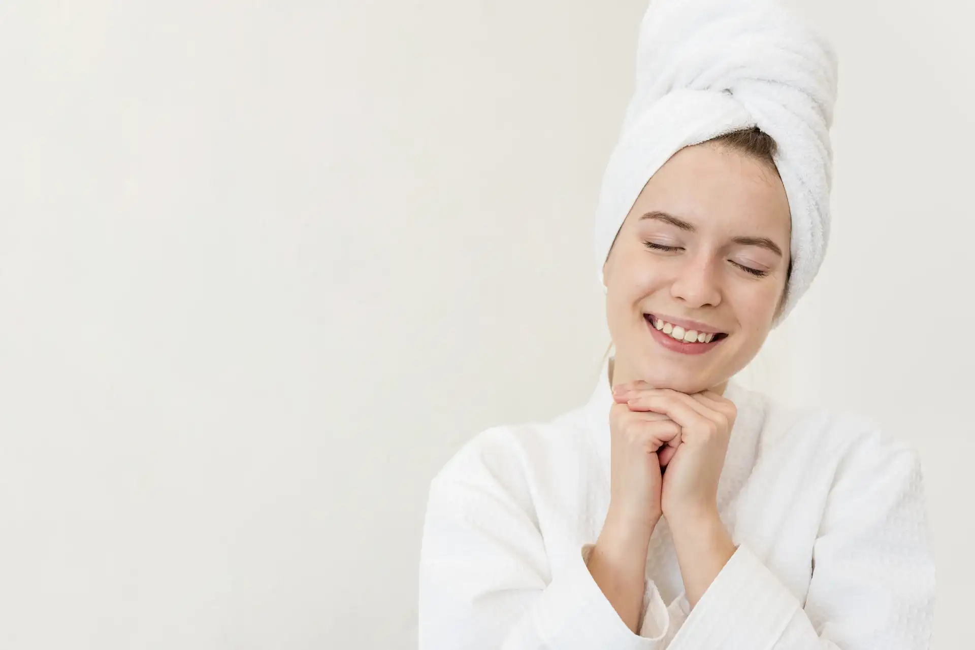Close-up of a woman with glowing, youthful skin after PDRN booster treatment
